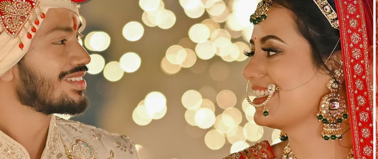 Detail of the bride and groom looking at each other